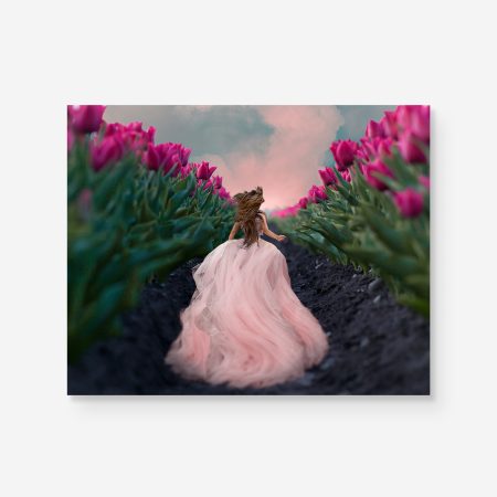girl running in tulip field